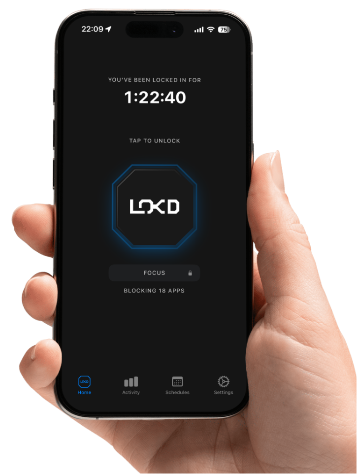 Hand holding a smartphone displaying the LOXD app interface.